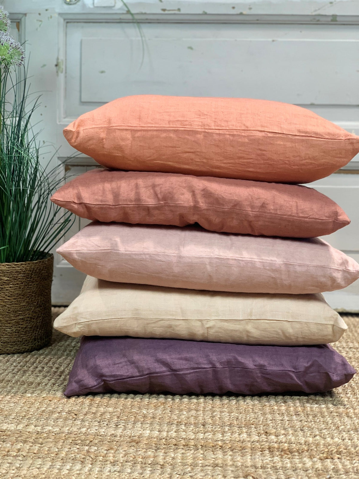 Linen pillows stacked on top of each other