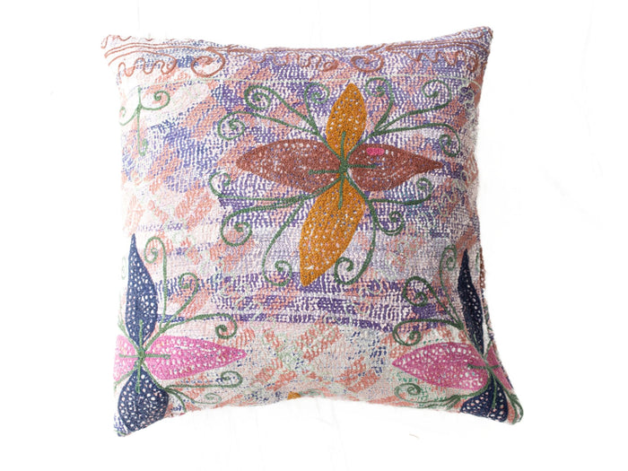 Colorful suzani pillowcase with oriental pattern in purple blue, ochre and green creepers on a light background for sari pillow and vintage boho pillow